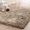 Alfombra de pelo largo beige 140x200